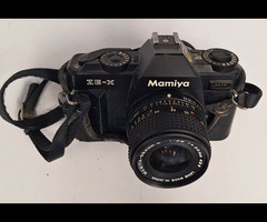 18.	Mamya ZE-X Film Camera with 28mm f/3.5 lens