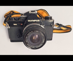 14.	Olympus OM-2 Film Camera with 28mm f/3.5 lens