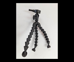 23.	Sunpak FlexGrip BKGY Flex Pod Gripper Tripod.
