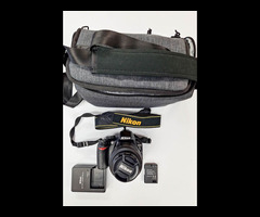 3.	Nikon D3100 Digital SLR Camera, 14.2 MP, DX Format with Nikkor AF-S 18-55mm f/3.5-5.6 G Lens