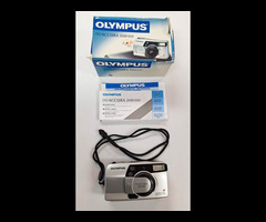 27. Olympus Accura Zoom 105R Film Camera with 28-105mm zoom lens in the original box.