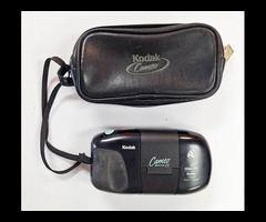 25. Kodak Cameo Motor Ex 35mm Film Camera in case with built in flash and 34mm f/4.5 Lens.