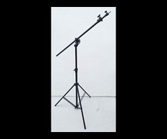 12.	Unbranded Light Stand, max height 71”